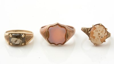 Lot 1029 - A banded agate signet ring, and two other rings