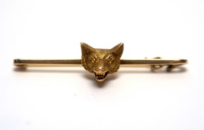 Lot 1005 - A high-carat yellow-metal sporting stock pin