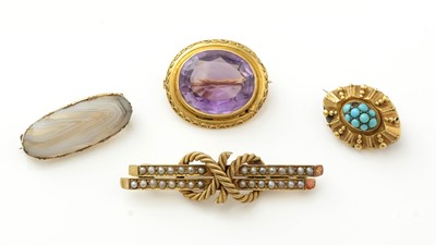 Lot 1065 - A 15ct yellow gold and seed pearl bar brooch, and three others