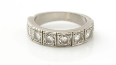 Lot 1066 - An eight stone diamond ring