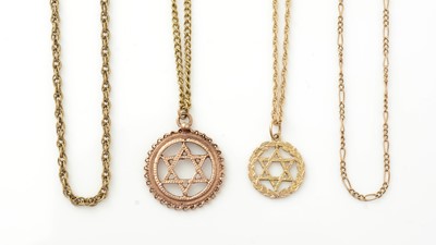 Lot 1080 - Two 9ct gold star of David pendants on chains; and two other chains