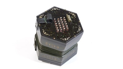 Lot 310 - A 48 button English system concertina
