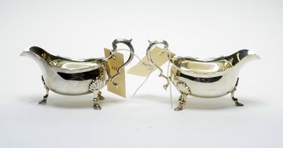 Lot 1250 - A pair of silver sauce boats, by Thomas Bradbury & Sons