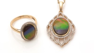 Lot 504 - An ammolite and diamond pendant and ring