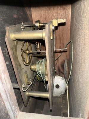 Lot 373 - A walnut wall clock