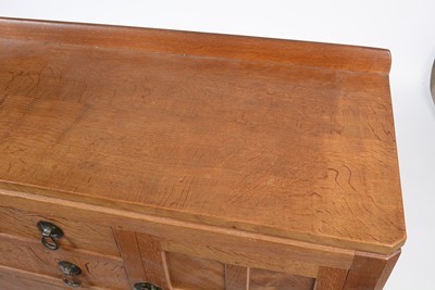 Lot 1335 - Robert 'Mouseman' Thompson of Kilburn: a 1950's 5' panelled English oak sideboard