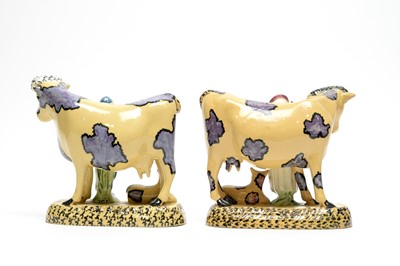 Lot 898 - Pair of South Yorkshire pottery Cow groups