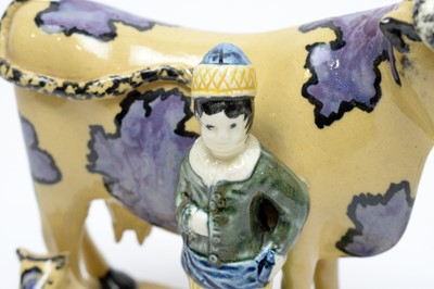 Lot 898 - Pair of South Yorkshire pottery Cow groups