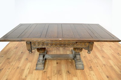 Lot 37 - An impressive mid 20th Century Jacobean revival carved oak extending dining table