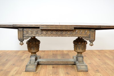 Lot 37 - An impressive mid 20th Century Jacobean revival carved oak extending dining table