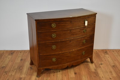 Lot 2 - A late Georgian bow fronted mahogany chest of drawers