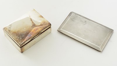 Lot 97 - A silver cigarette case by Goldsmiths and Silversmiths Co. Ltd and a silver mounted cigarette box