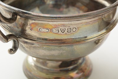 Lot 98 - A selection of silver trophy cups and rose bowls