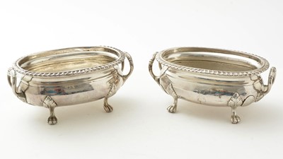 Lot 124 - A pair of Georgian silver sauce tureens with regimental engraved crest