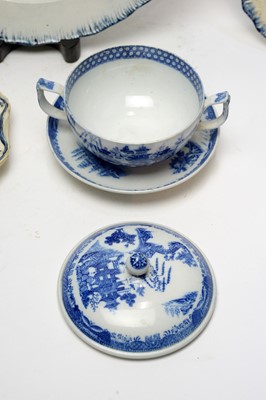 Lot 896 - Pearlware charger, three plates, écuelle cover and stand