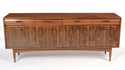 Lot 1348 - A mid Century teak and rosewood sideboard, possible by Elliotts of Newbury