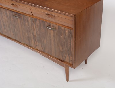 Lot 1348 - A mid Century teak and rosewood sideboard, possible by Elliotts of Newbury