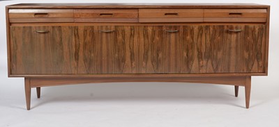 Lot 1348 - A mid Century teak and rosewood sideboard, possible by Elliotts of Newbury