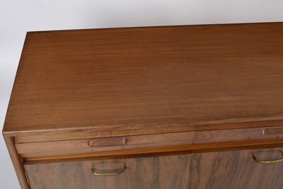 Lot 1348 - A mid Century teak and rosewood sideboard, possible by Elliotts of Newbury