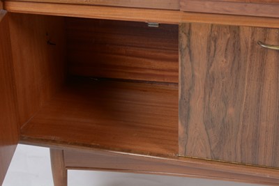 Lot 1348 - A mid Century teak and rosewood sideboard, possible by Elliotts of Newbury