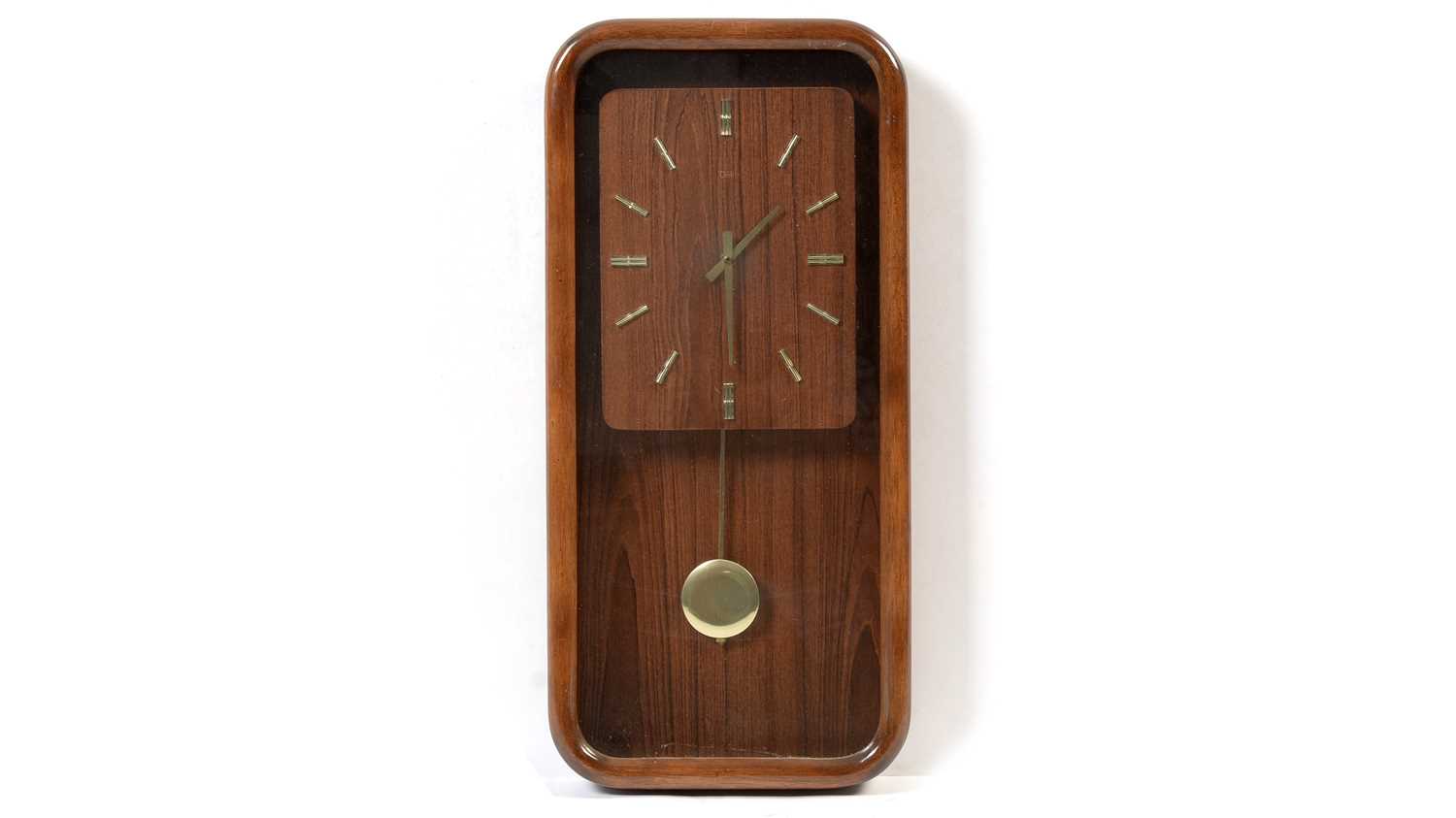 Lot 61 - Deko: A mid-Century teak framed wall clock of rectangular form