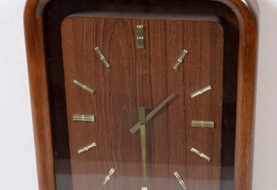 Lot 61 - Deko: A mid-Century teak framed wall clock of rectangular form