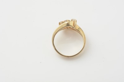 Lot 173 - A three stone diamond ring