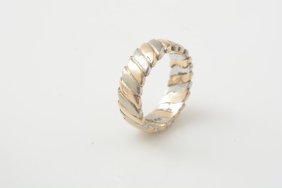 Lot 176 - A platinum wedding band and two other rings