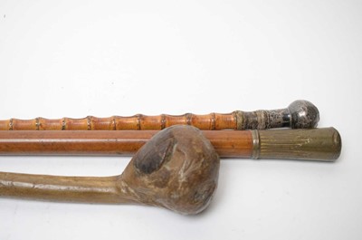 Lot 396 - A silver topped bamboo cane swagger stick