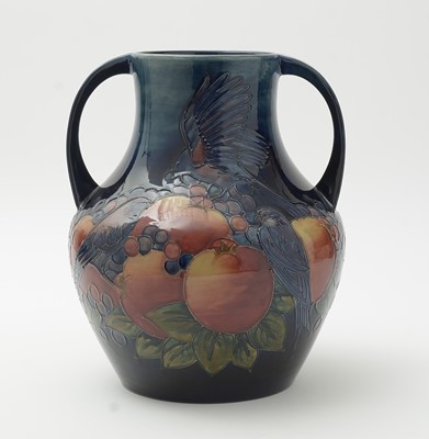Lot 117 - Moorcroft 'Finch and Berry' twin handles vase