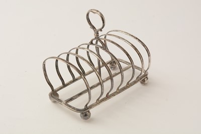 Lot 94 - A Victorian silver seven-bar toast rack, by William Hutton & Sons