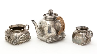 Lot 227 - A late 19th Century Chinese silver three-piece tea set