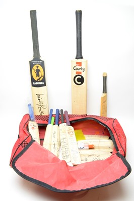Lot 765 - A collection of signed cricket bats