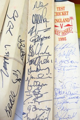 Lot 765 - A collection of signed cricket bats