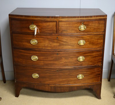 Lot 59 - George III mahogany and line inlaid bowfront chest.