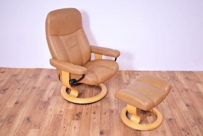 Lot 4 - A contemporary Scandinavian Ekornes Consul Stressless reclining armchair and matching ottoman