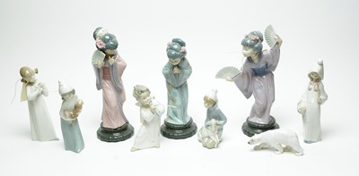 Lot 260 - A collection of decorative ceramic figures