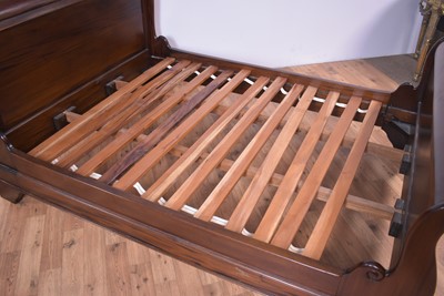 Lot 33 - A modern mahogany 'lit en bateau' double bed