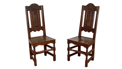 Lot 1429 - Two 18th Century oak high back dining chairs