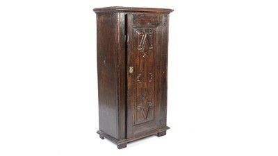 Lot 1431 - An oak cupboard