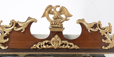 Lot 1310 - An ornate late 19th Century giltwood and mahogany wall mirror