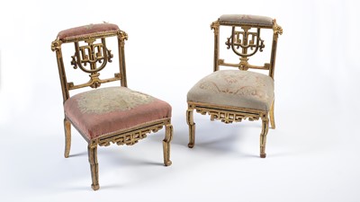 Lot 1435 - A pair of Napoleon III giltwood slipper chairs in the Chinese taste