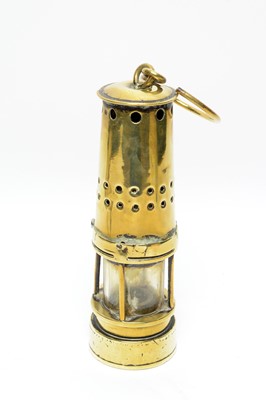 Lot 702 - A Motorcycle lamp, miner's lamp and other items.