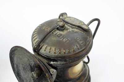 Lot 702 - A Motorcycle lamp, miner's lamp and other items.