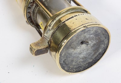 Lot 702 - A Motorcycle lamp, miner's lamp and other items.