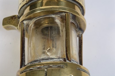 Lot 702 - A Motorcycle lamp, miner's lamp and other items.