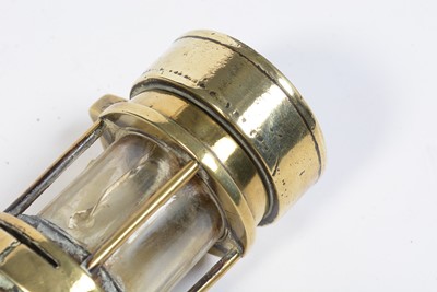 Lot 702 - A Motorcycle lamp, miner's lamp and other items.