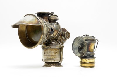 Lot 702 - A Motorcycle lamp, miner's lamp and other items.