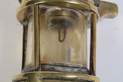 Lot 702 - A Motorcycle lamp, miner's lamp and other items.