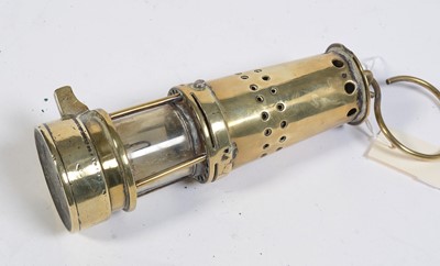 Lot 702 - A Motorcycle lamp, miner's lamp and other items.